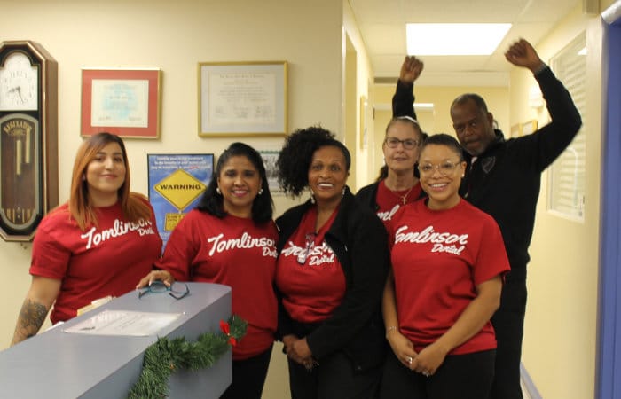 Receptionist and Hygienists posing for picture