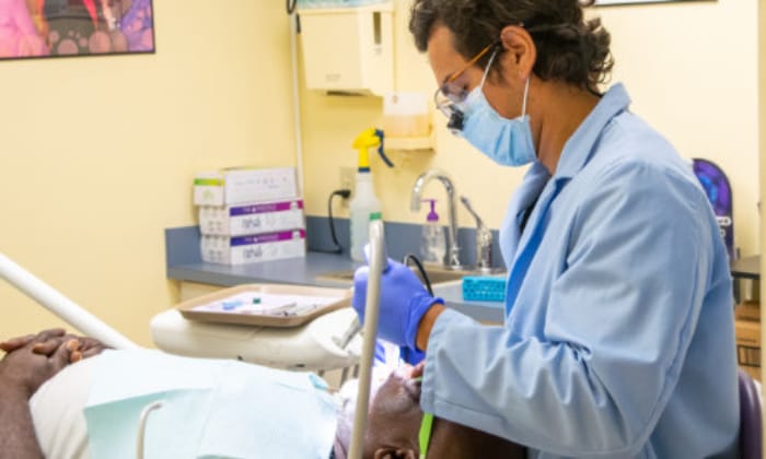 Dentist working on patient